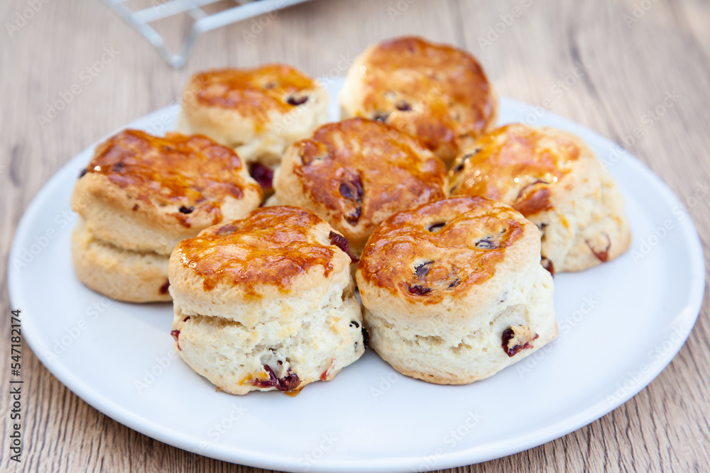 Cranberry scone set with raspberry jam and clotted cream