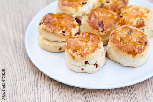 Cranberry scone set with raspberry jam and clotted cream