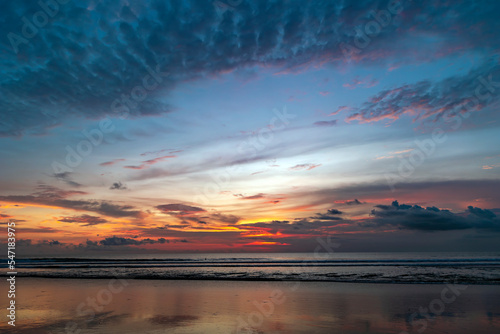 Beautiful colorful sunset over the Indian Ocean in Bali  Indonesia. Desktop wallpaper. Nature. Travel concept. 
