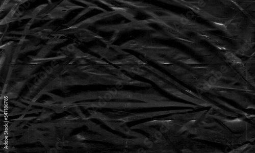 Background texture of a polyethylene, plastic transparent black plastic film, transparent stretched black and white metaverse crypto blockchain background

