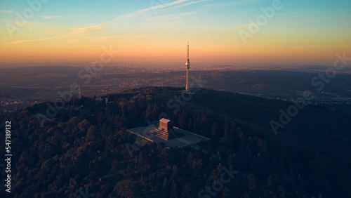 Aerial shot of mountain Avala  communication tower and a monument of unknown hero  symbols of Belgrade  Serbia.