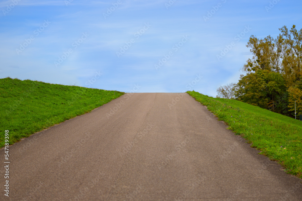Completely empty spuky road uphill Completely empty spuky road uphill