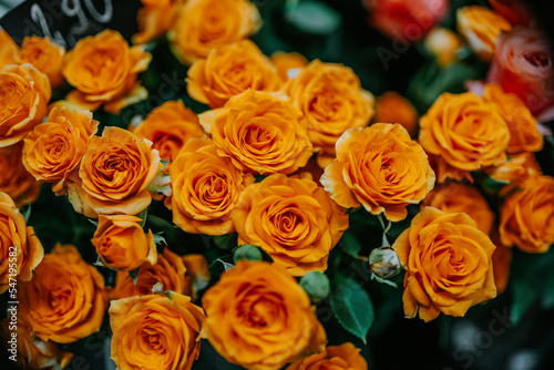 orange flower bouquet with roses 