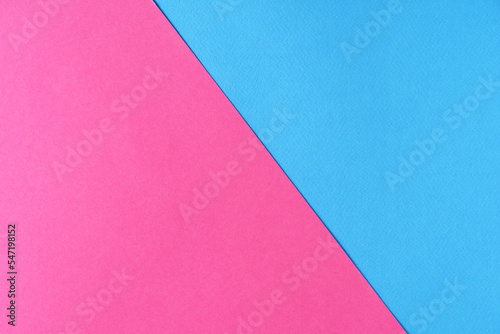 Background of blue and pink paper of pastel colors, geometric pattern.