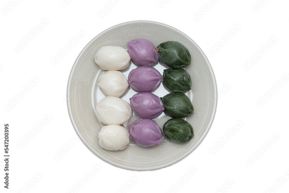 Delicious-looking three-color honey rice cakes served in a bowl Delicious-looking three-color honey rice cakes served in a bowl