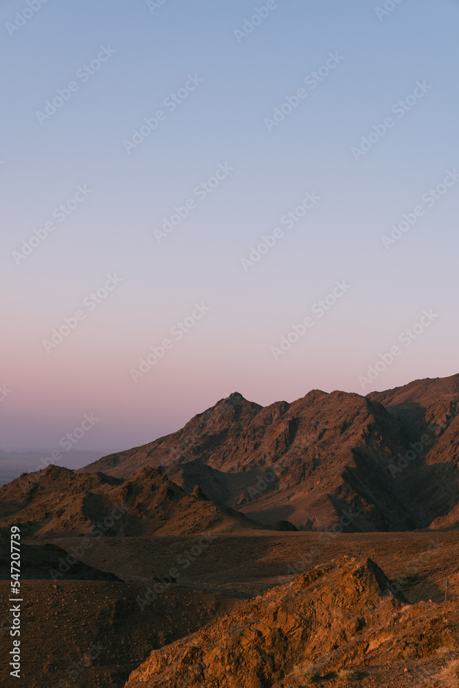 sunset in the desert mountains