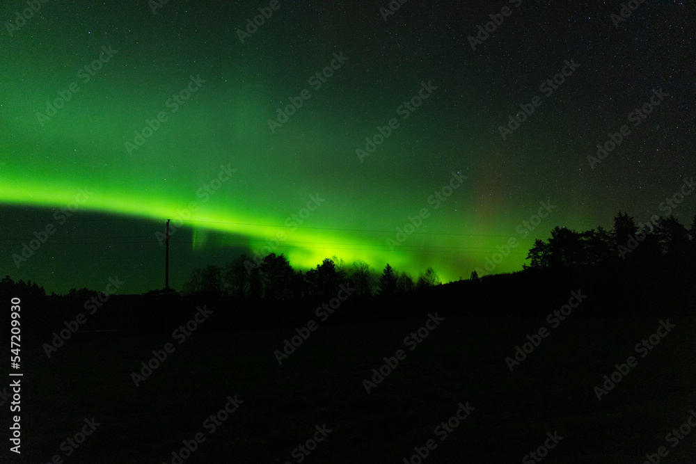 Strong Aurora borealias in eastern Finland in autumn night.