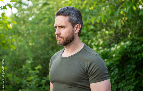 pensive bearded man in shirt. caucasian man with beard. mature man outdoor