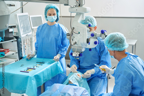 Two surgeons doing an operation in hospital