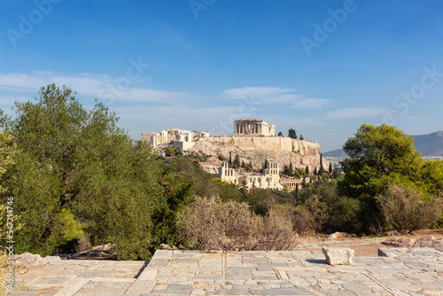Historic Landmark, Odeon of Herodes Atticus, in the Acropolis of Athens, Greece. Sunny Day viewed from Philopappos Hill.