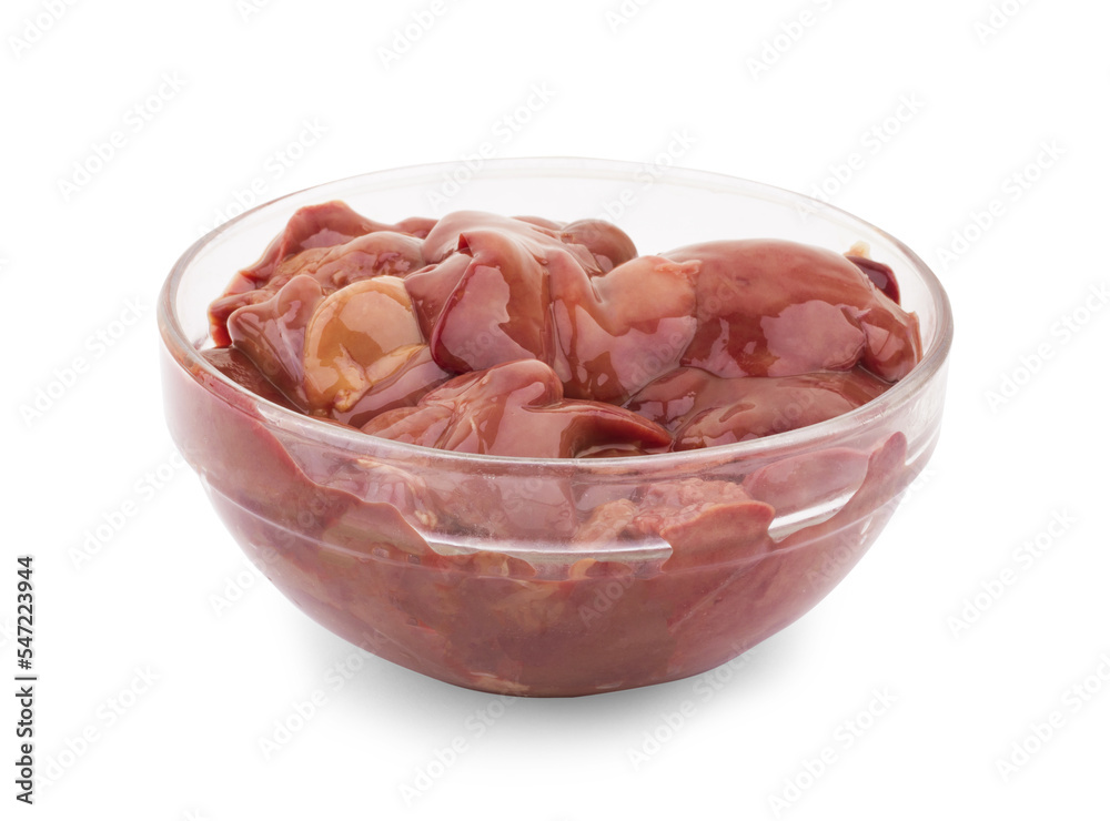Raw liver on wooden board with spices and condiments isolated on white