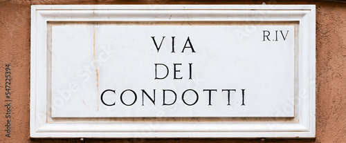 Rome, Italy. Street plate of the famous Condotti Road - Via dei Condotti - center of the Roman luxury shopping. photo