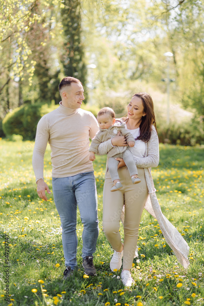 Family Enjoying Walk In Park Family Enjoying Walk In Park