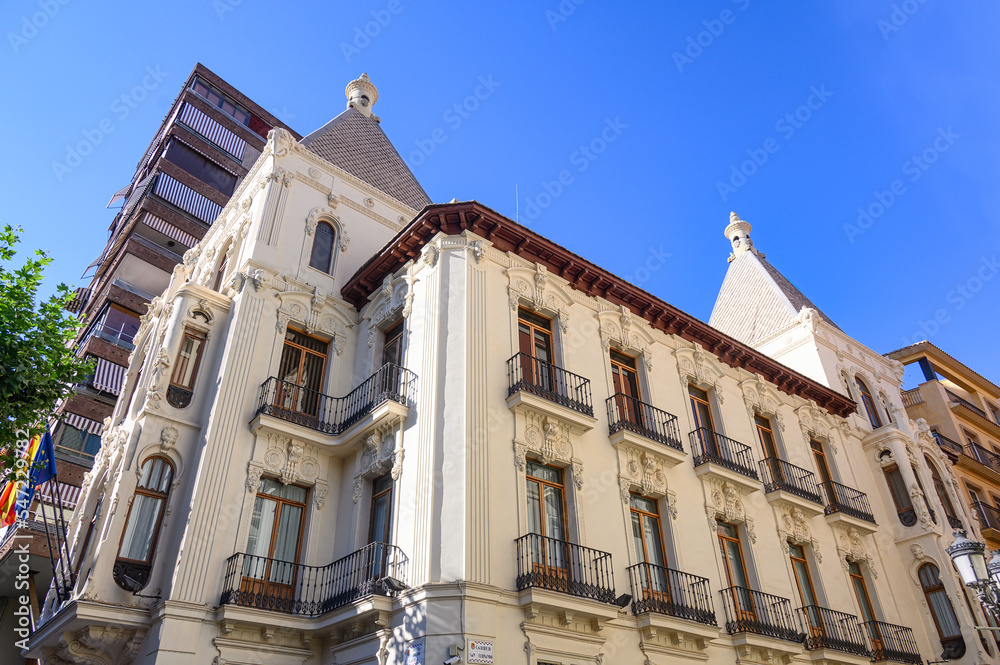 The colonial exterior architecture of building on San Fernando street in Valencia, Spain