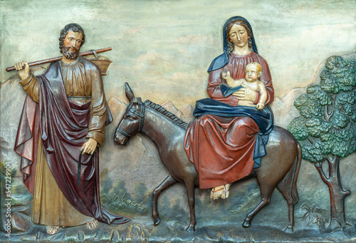 Fotografie ANNECY, FRANCE - JULY 11, 2022: The  carved polychrome relief of Flight to Egypt in St