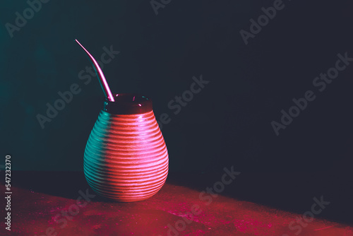 yerba mate drink in neon light