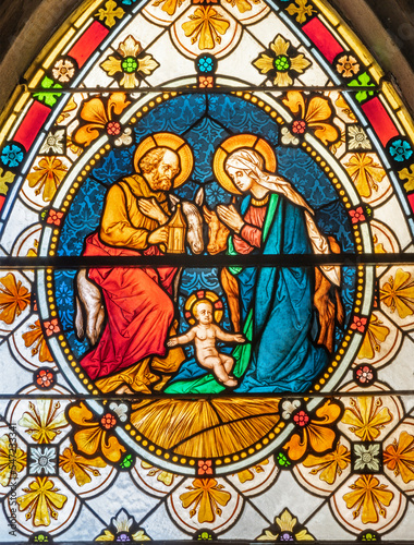 BIELLA  ITALY - JULY 15  2022  The Holy Family in the stained glass of Duomo from 19. cent.