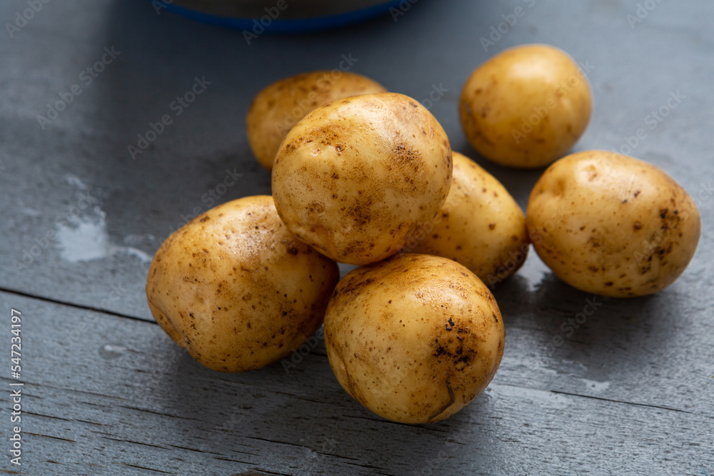 Close up washed potatoes root food cooking Close up washed potatoes root food cooking