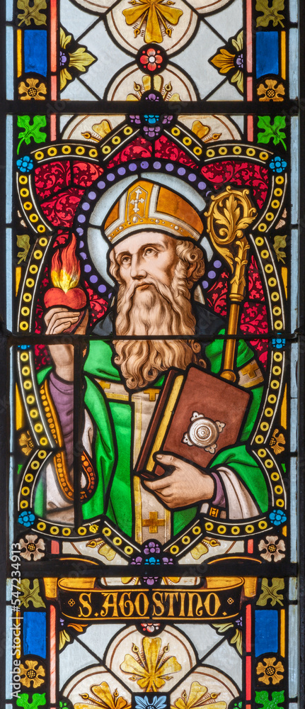 BIELLA, ITALY - JULY 15, 2022: The St. Augustine in the stained glass of Duomo from 19. cent.