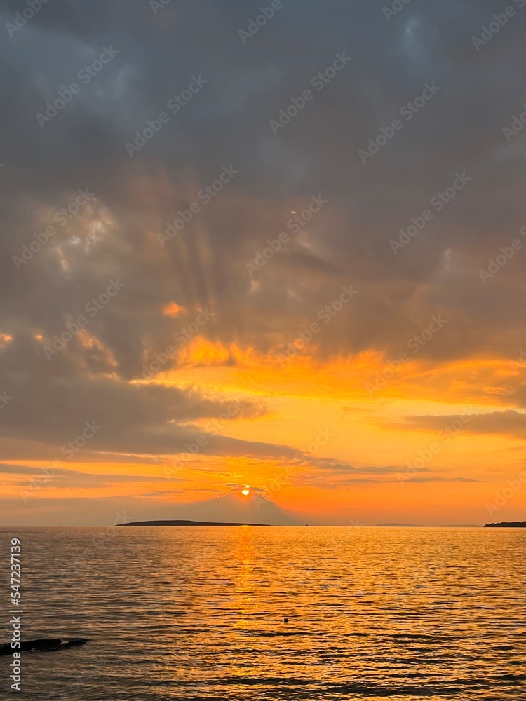 Fantastic orange sunset at the sea, seascape view