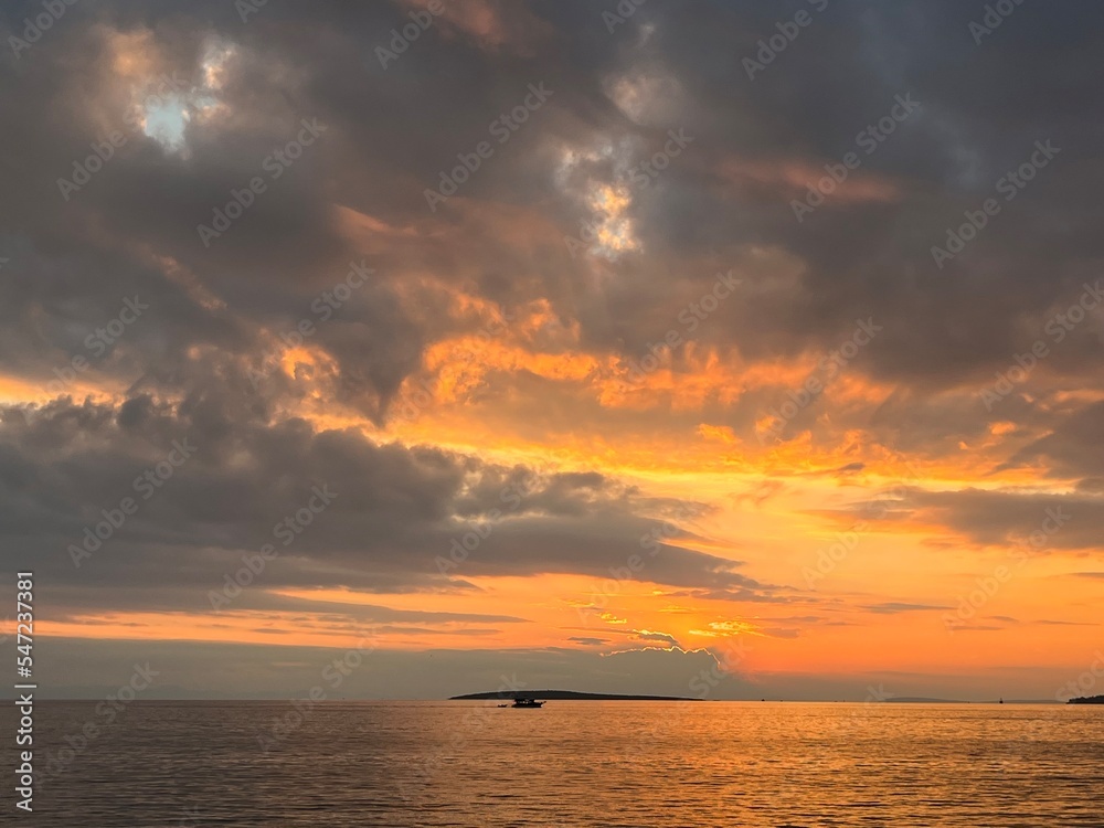 Fantastic orange sunset at the sea, seascape view