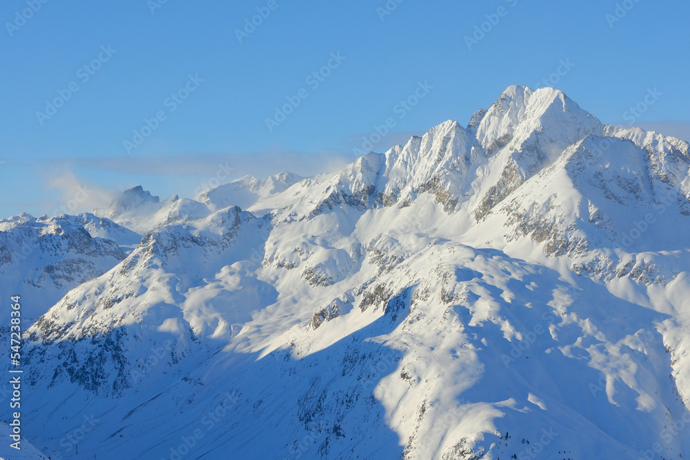 Winter high mountain landscape in Switzerland Alps.