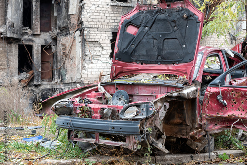 damaged and looted cars in a city in Ukraine during the war