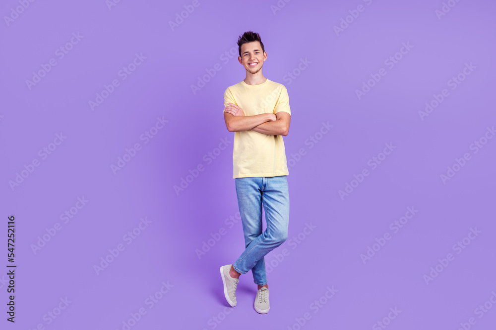 Full size photo of young cheerful man happy positive smile agent crossed hands isolated over bright color background
