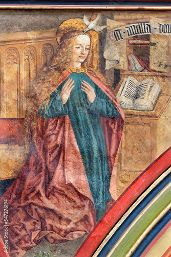 BERN, SWITZERLAND - JUNY 27, 2022: The Virgin Mary as the detail of fresco of Annunciation in the church Franzosichche Kirche by anonym Nelkenmeister (1495-1500).