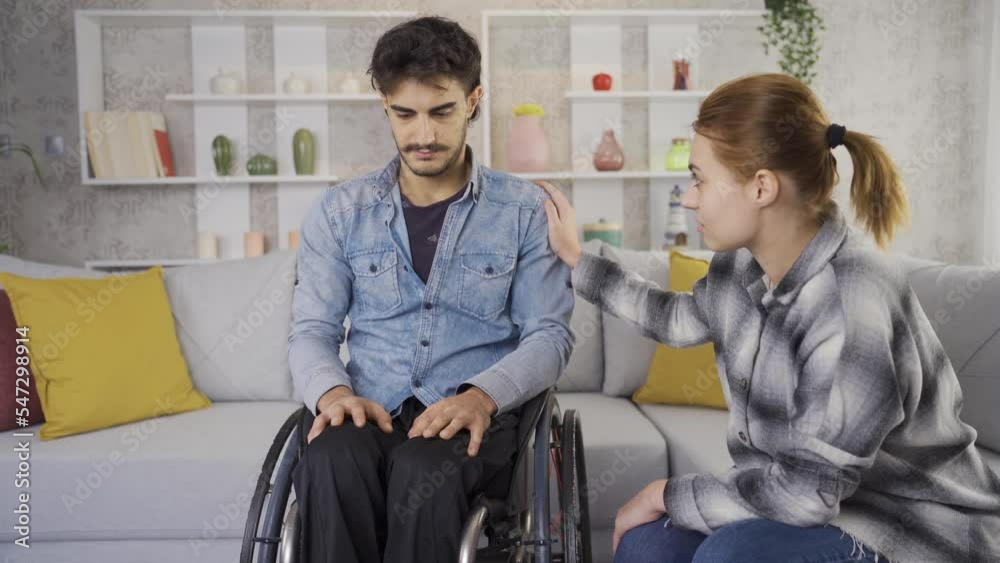 Disabled male man in wheelchair chatting with friend at home.
His girlfriend who supports the disabled man who is in a bad mood.
Raise awareness.
Disabled male man in wheelchair chatting with friend at home.
His girlfriend who supports the disabled man who is in a bad mood.
Raise awareness.