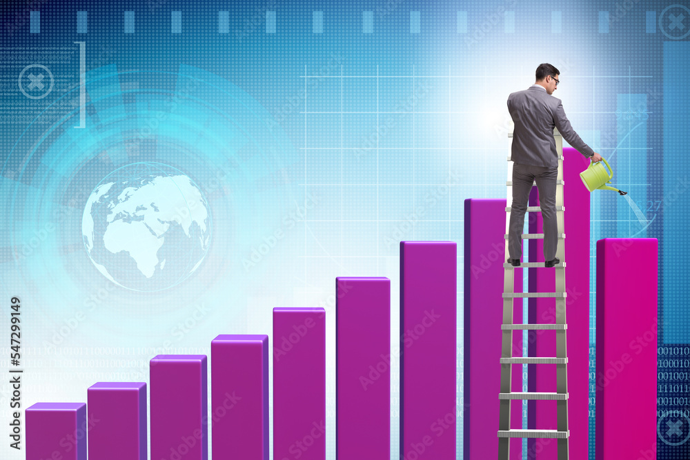 Businessman in investment growth concept with watering can Businessman in investment growth concept with watering can