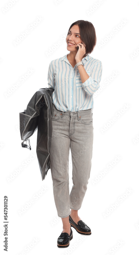 Woman holding garment cover with clothes while talking on phone, isolated on white. Dry-cleaning service Woman holding garment cover with clothes while talking on phone, isolated on white. Dry-cleaning service