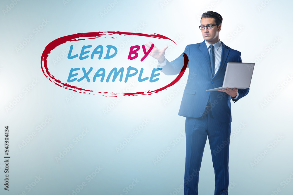 Businessman in lead by example concept Businessman in lead by example concept