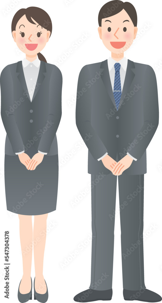 笑顔で手を揃えるスーツ姿の男女