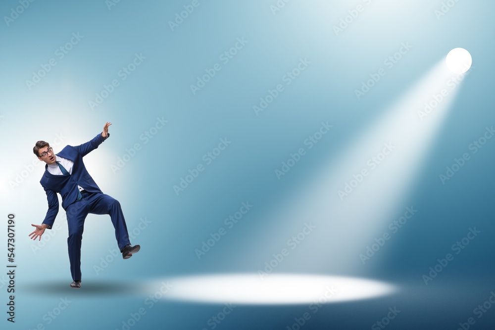 Business people under the spotlight Business people under the spotlight