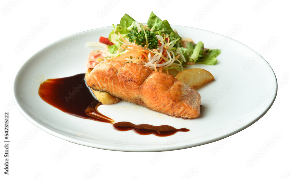 Salmon fillet served with vegetables and potatoes in restaurant menus Salmon fillet served with vegetables and potatoes in restaurant menus