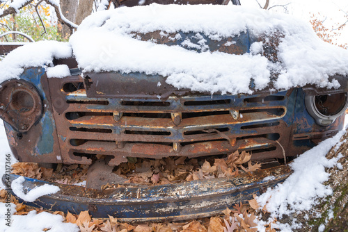 Old rusted truck in the woods. photo