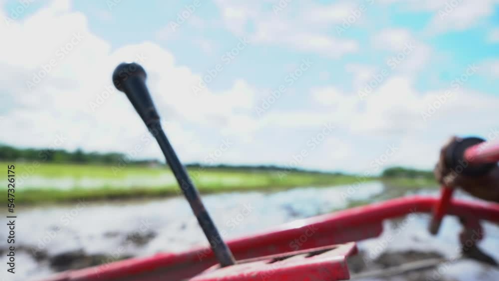 grown man's hand shook. holding the handlebars of the plow. grown man's hand shook. holding the handlebars of the plow.