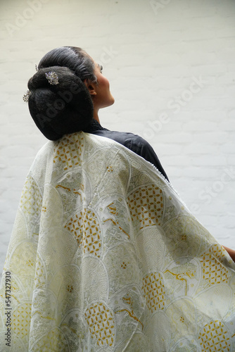 women with natural dyed Javanese batik