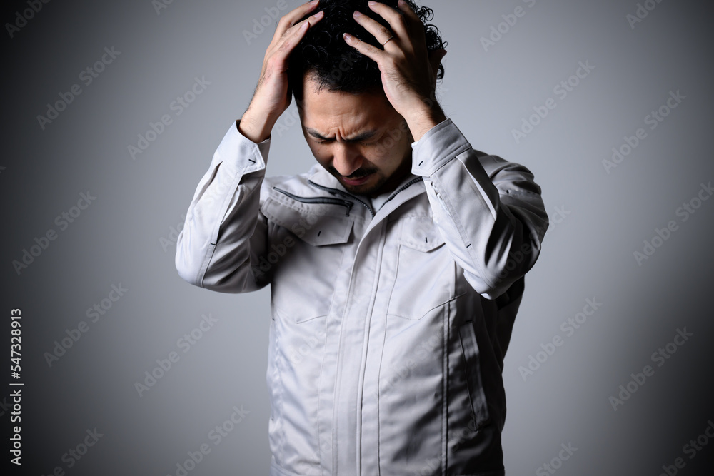 Image of a business owner who is having trouble managing his business and getting his head around it. Image of a business owner who is having trouble managing his business and getting his head around it.