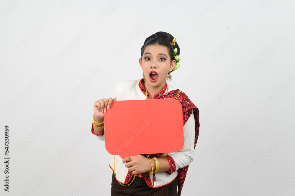 Young beautiful woman in Thai lanna costume with blank speech bubble sign Young beautiful woman in Thai lanna costume with blank speech bubble sign