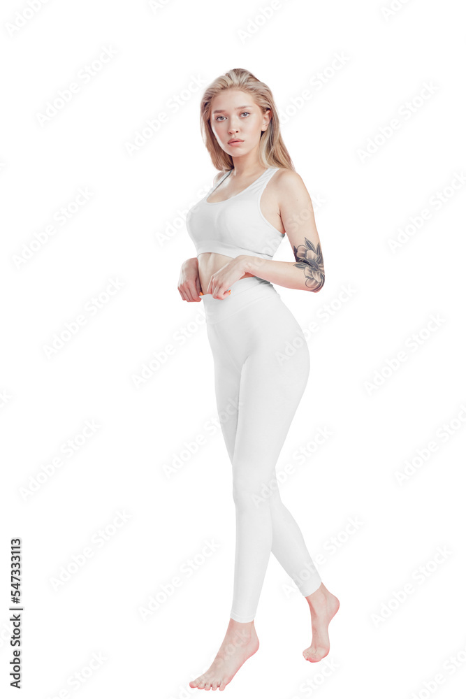 Young blonde woman in a white sports top and leggings. Mock-up. Png. Young blonde woman in a white sports top and leggings. Mock-up. Png.