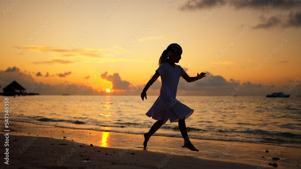 Fun Beach Travel Vacation. Kid Running In Sunset
