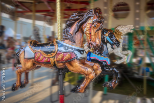 A wooden carousel horse at the local county fair.