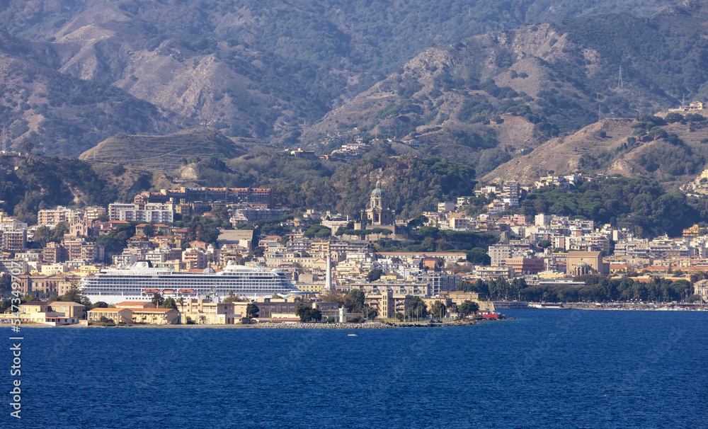 Downtown City by the Sea with mountain background. Messina, Sicilia, Italy. Sunny Morning.