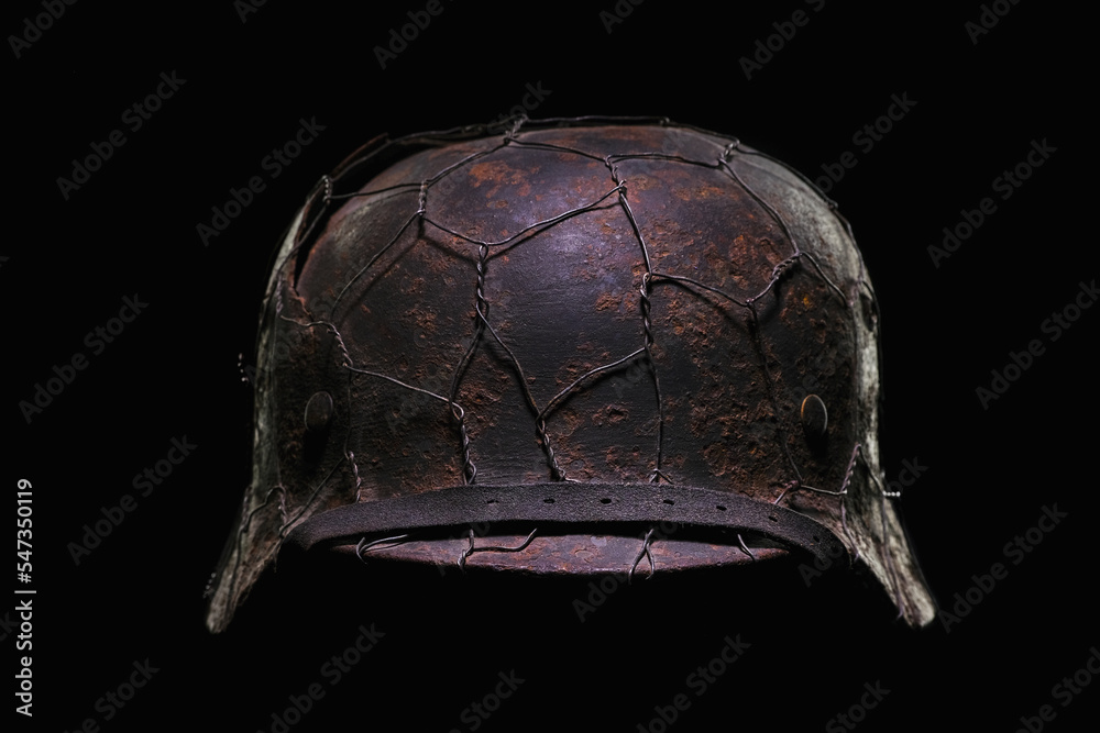 German helmet with camouflage net Stock Photo | Adobe Stock