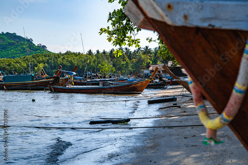 Beach view with long tail boats in koh Mook or koh Muk island, in Trang, Thailand photo