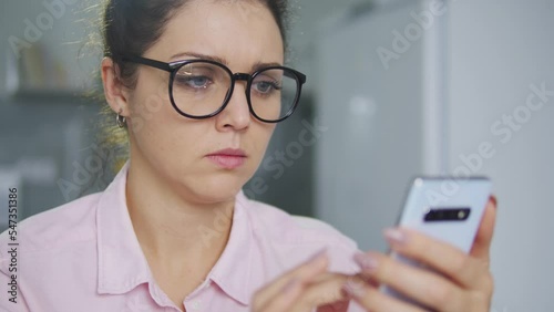 Wallpaper Mural Young woman is worried, forget password and can't unlock her smartphone, bugs Torontodigital.ca