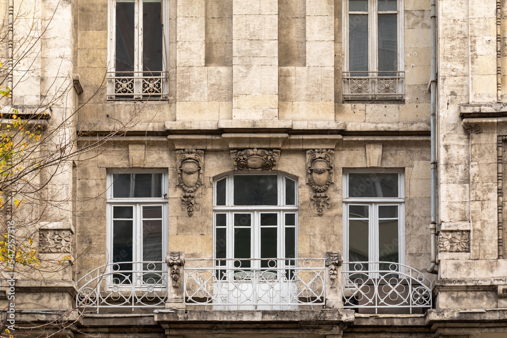 Architectural detail of neoclassical buildings in Istanbul. Facade parts. Windows of houses in art nouveau style.