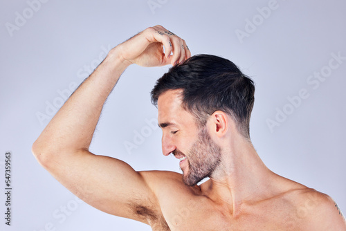 Beauty, armpit and fresh with a man model in studio on a gray background for hygiene or body care. Skincare, health and underarm with a handsome young male posing to promote wellness or bodycare